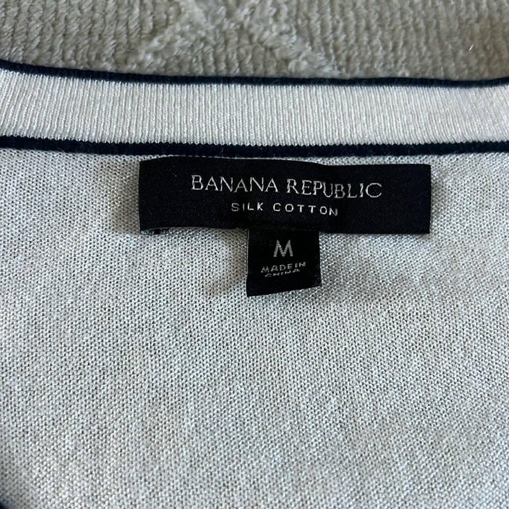 Cream and navy v neck sweater.  Only worn 2 times. Great condition